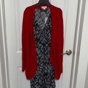 Red sweater with black and white dress